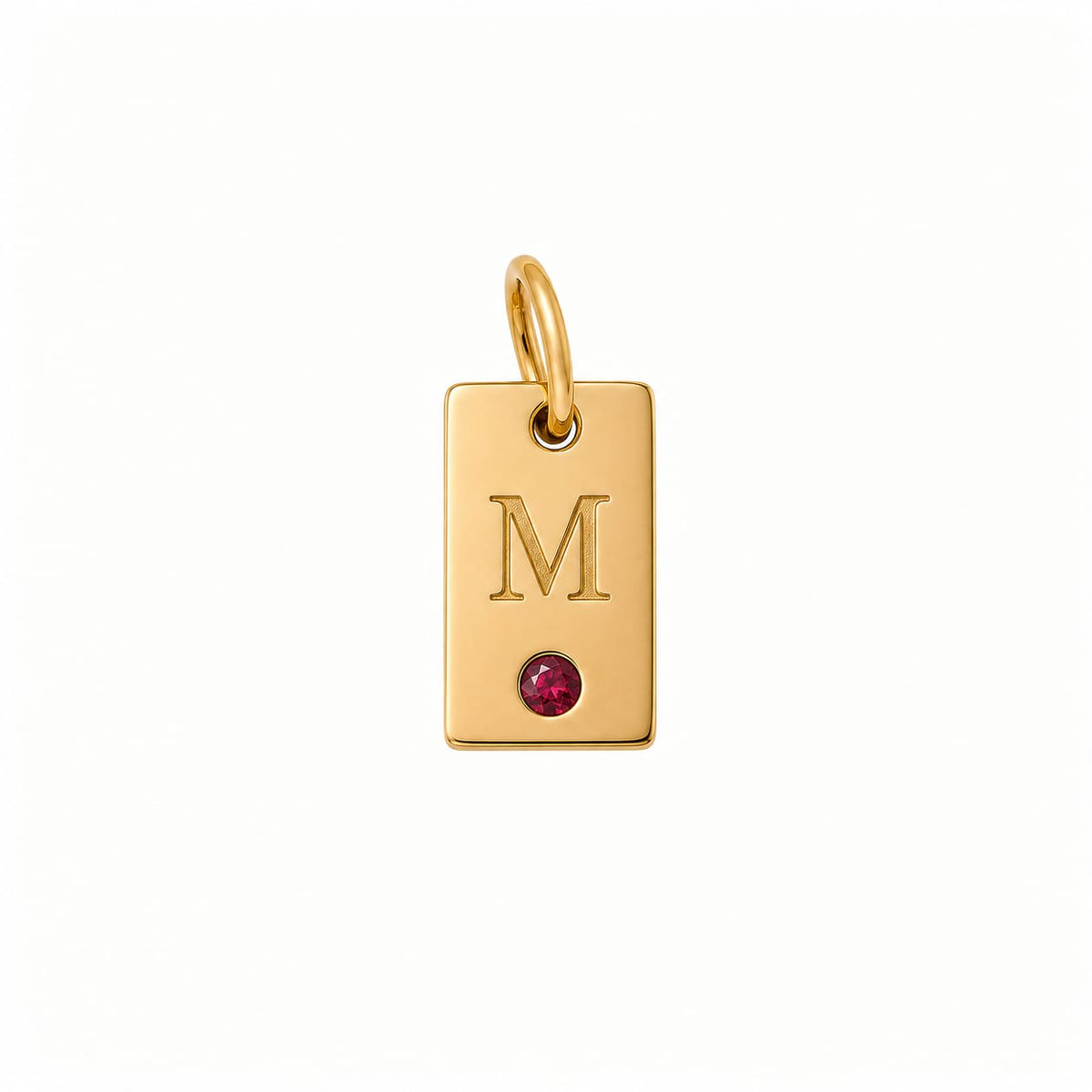 Placa inicial 'M' con gema roja