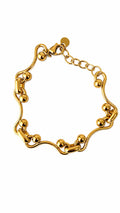 Pulsera Aros forma herradura con 2 Bolitas