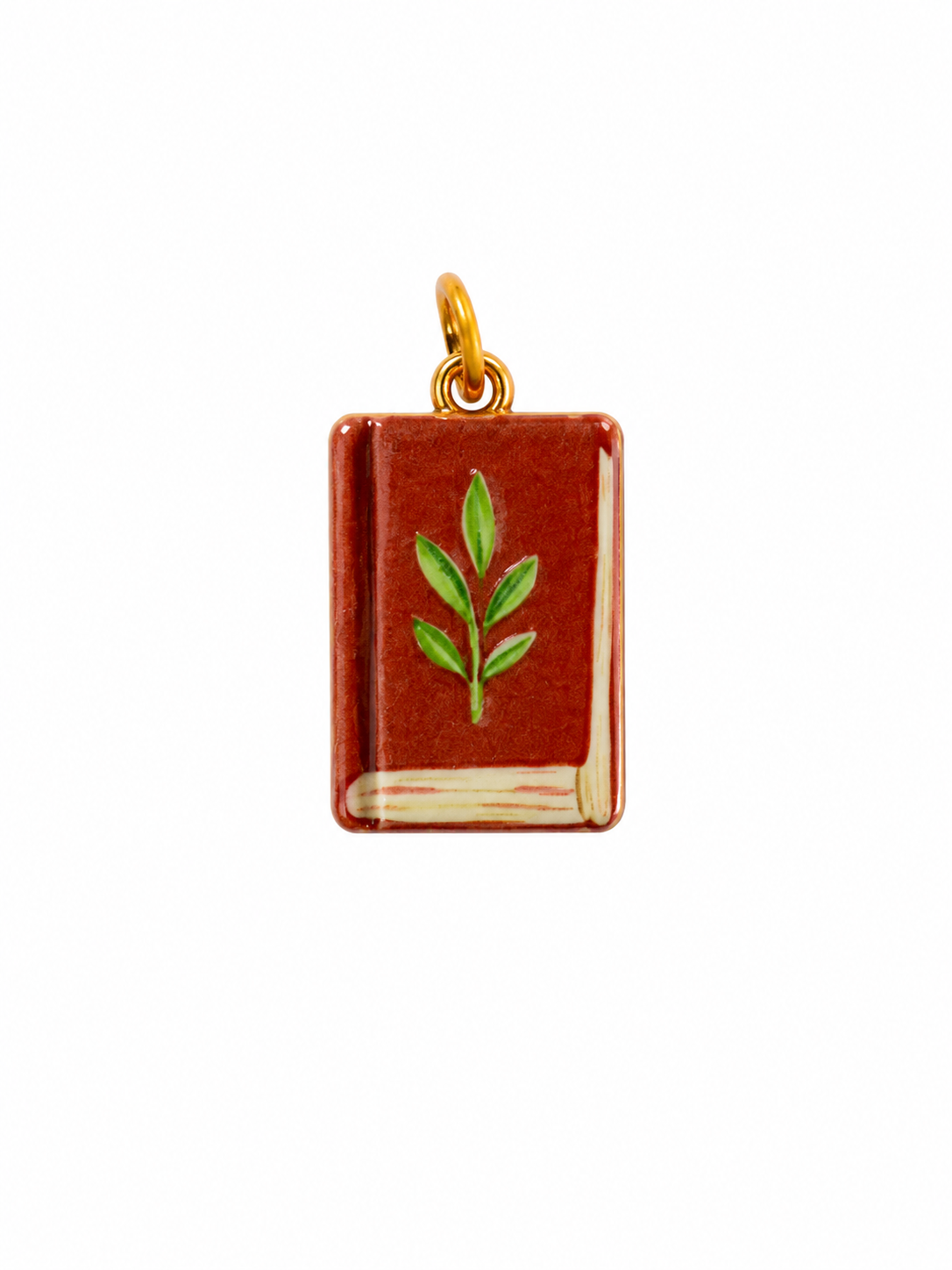 Libro marrón con hoja verde